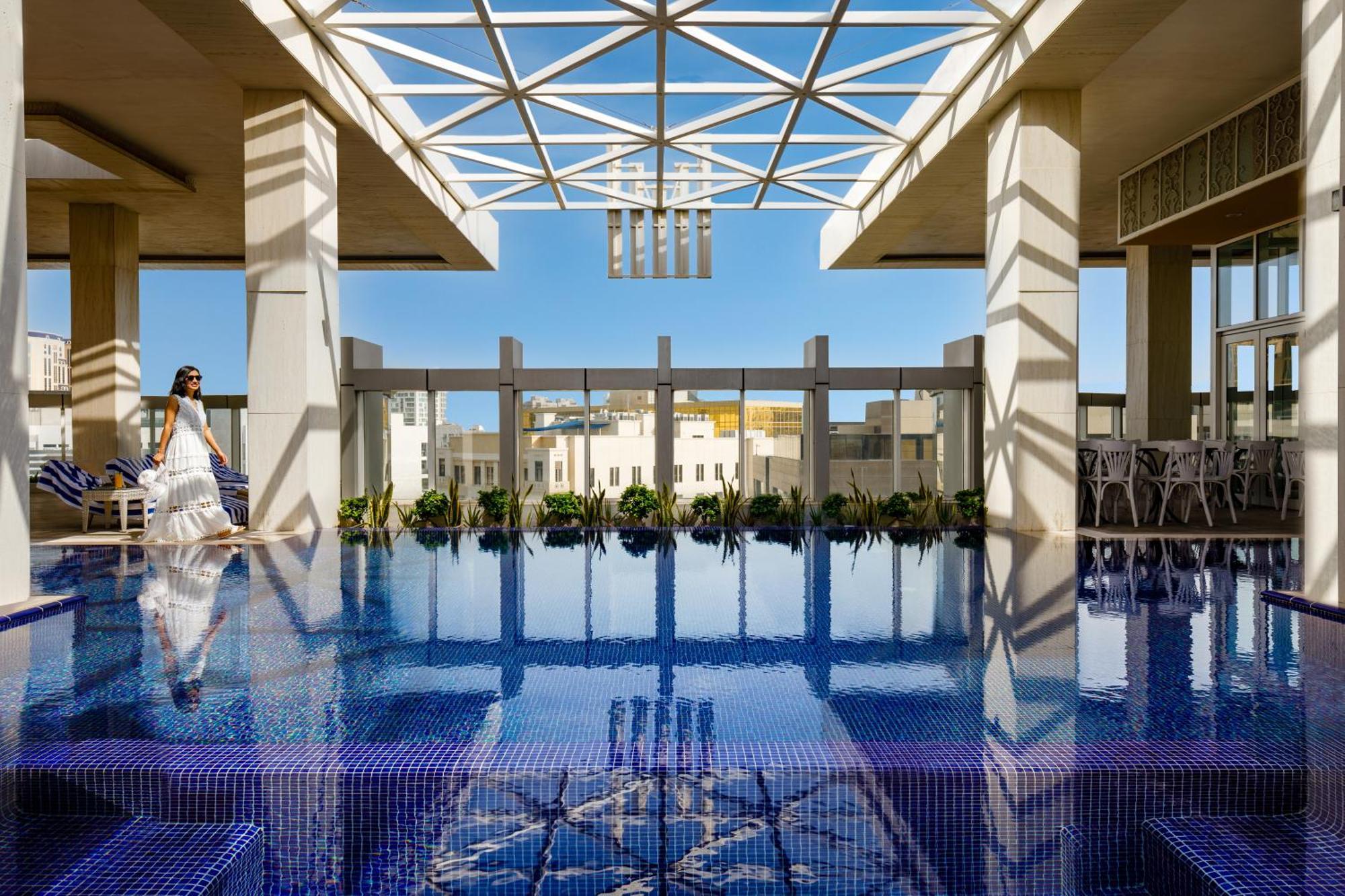 Millennium Place Doha Exterior photo The rooftop pool at the Four Seasons Hotel, Cairo