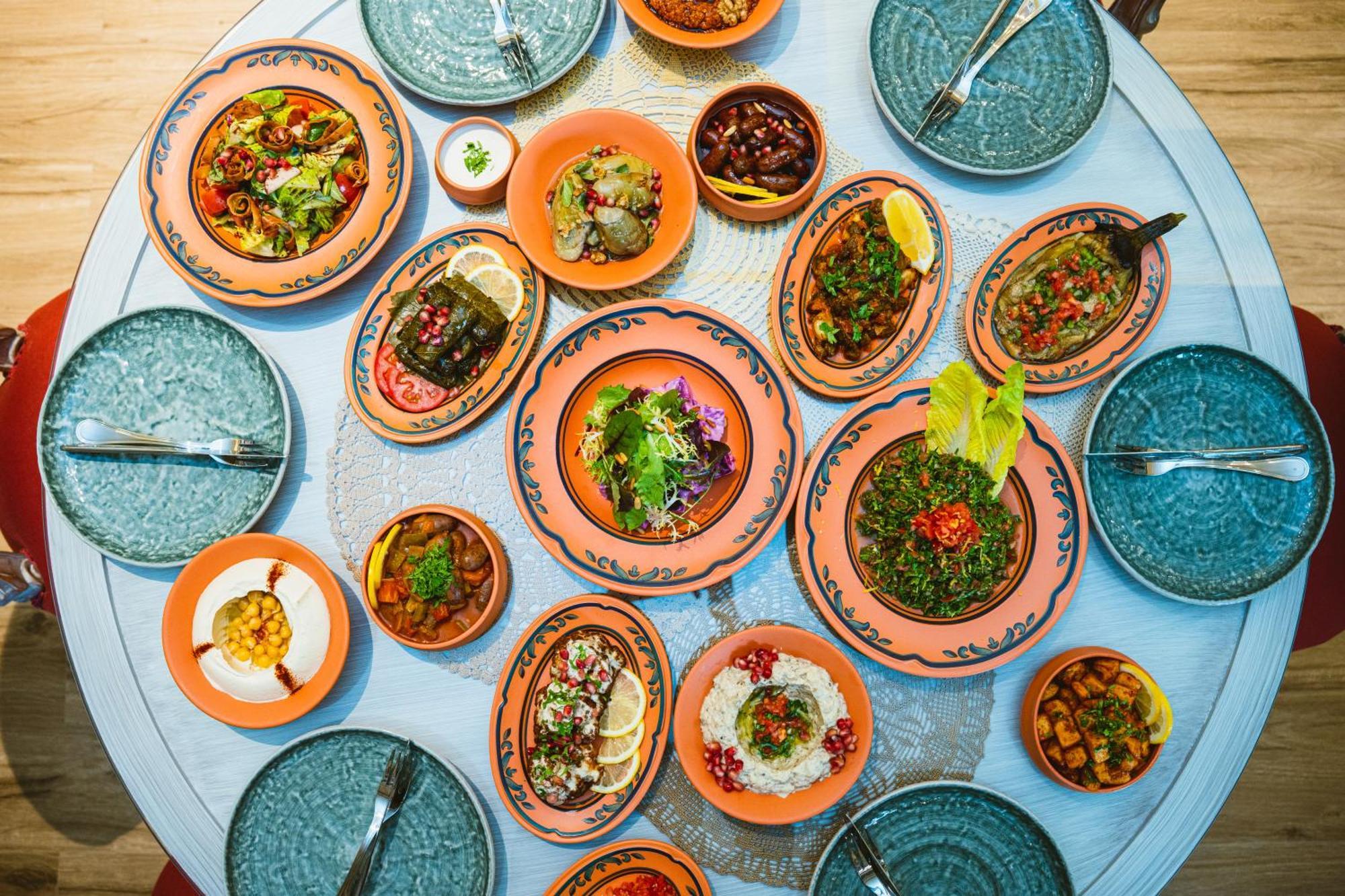 Millennium Place Doha Exterior photo A selection of meze