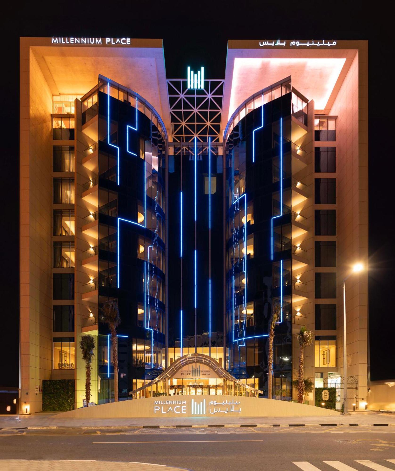 Millennium Place Doha Exterior photo The hotel at night