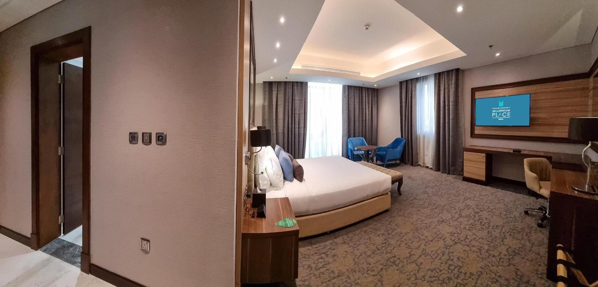 Millennium Place Doha Exterior photo A bedroom at the hotel